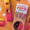 Peach Rings Fryd Carts disposable vape with juicy, sweet peach flavor, subtle tangy undertones, smooth hits, premium THC live resin, authentic Fryd vape product